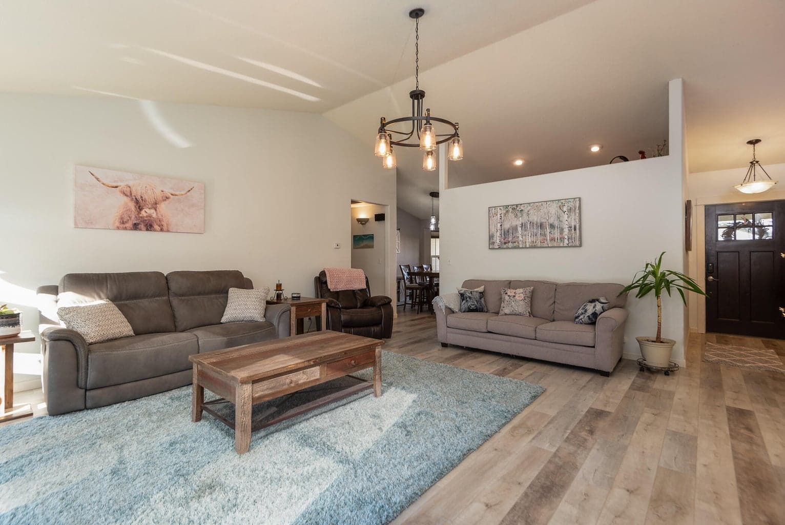 Living to Dining, on left, and foyer, guest rooms on right.
