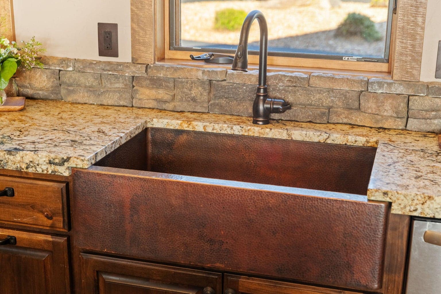 Copper sinks and fixtures throughout.