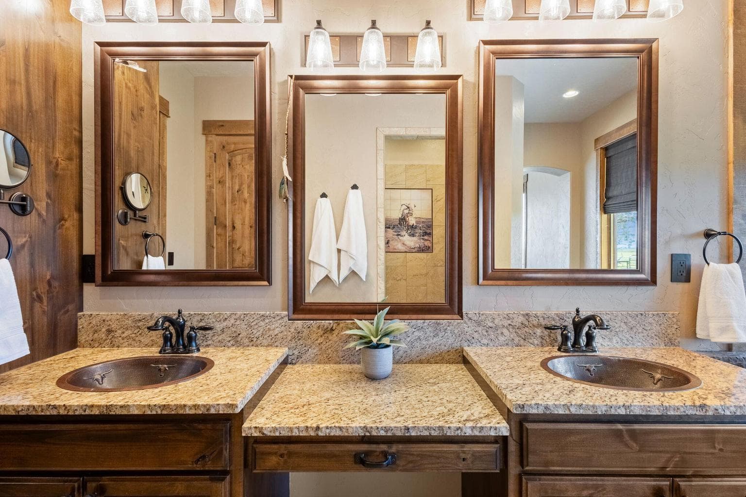 Primary bath with dual sinks and granite counters.