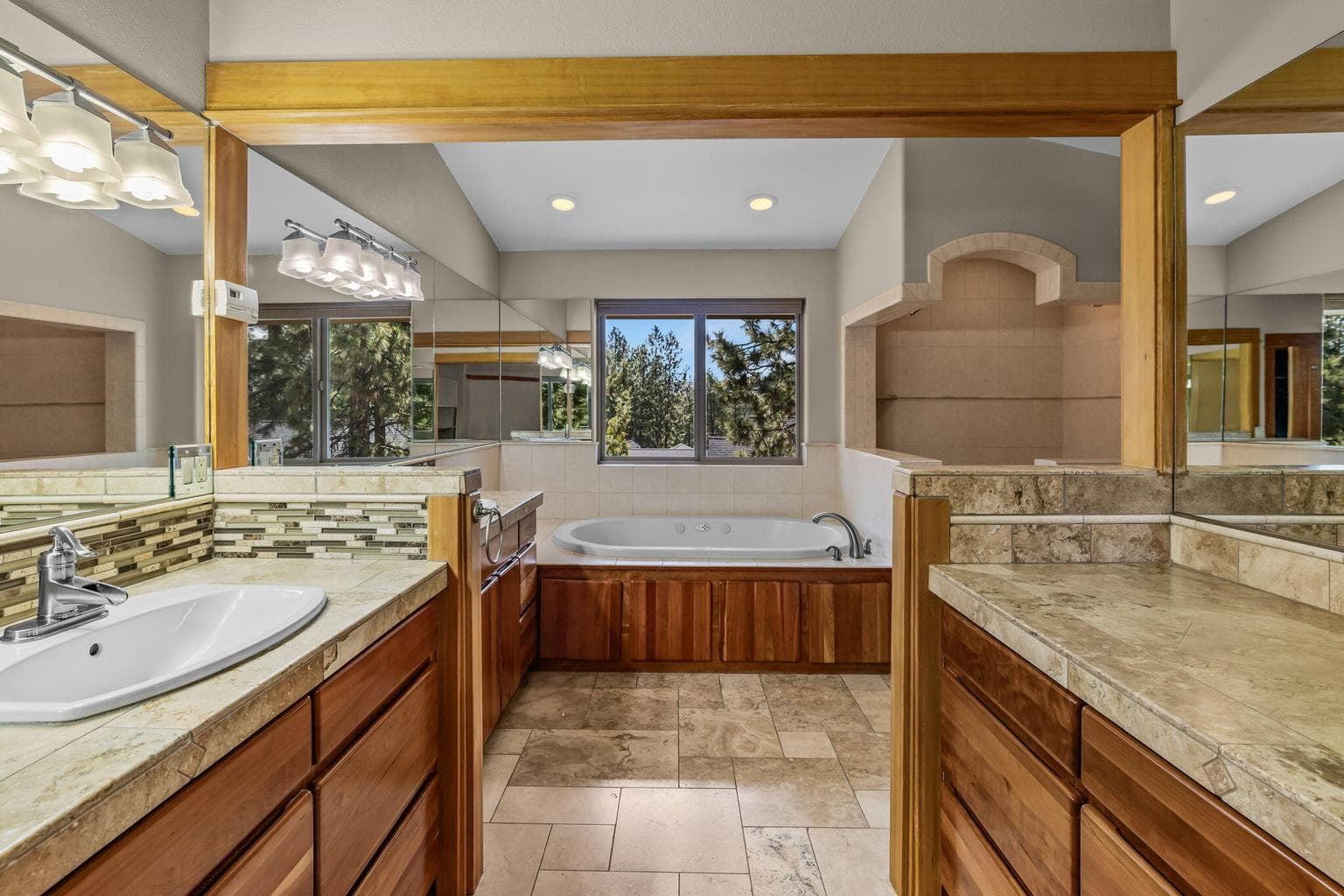 Dual vanities, soaking tub & a peek at the mountains!