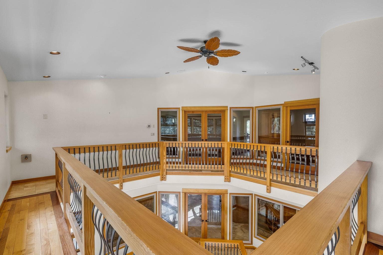 Upper catwalk looking to Primary Suite