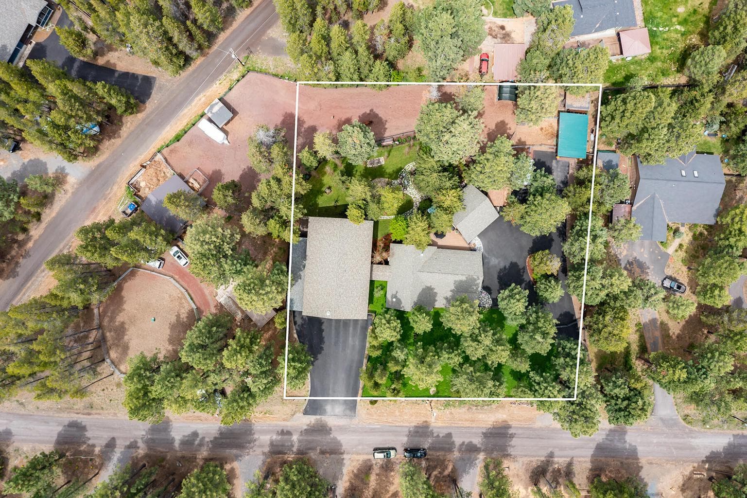 This shows the approximate lot line for the main home. The adjoining lot on the left is also for sale.