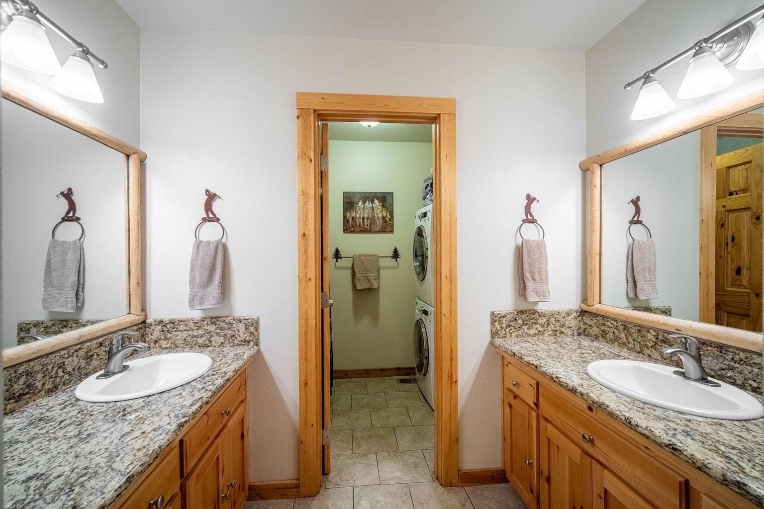 Primary bathroom with dual sinks and counters