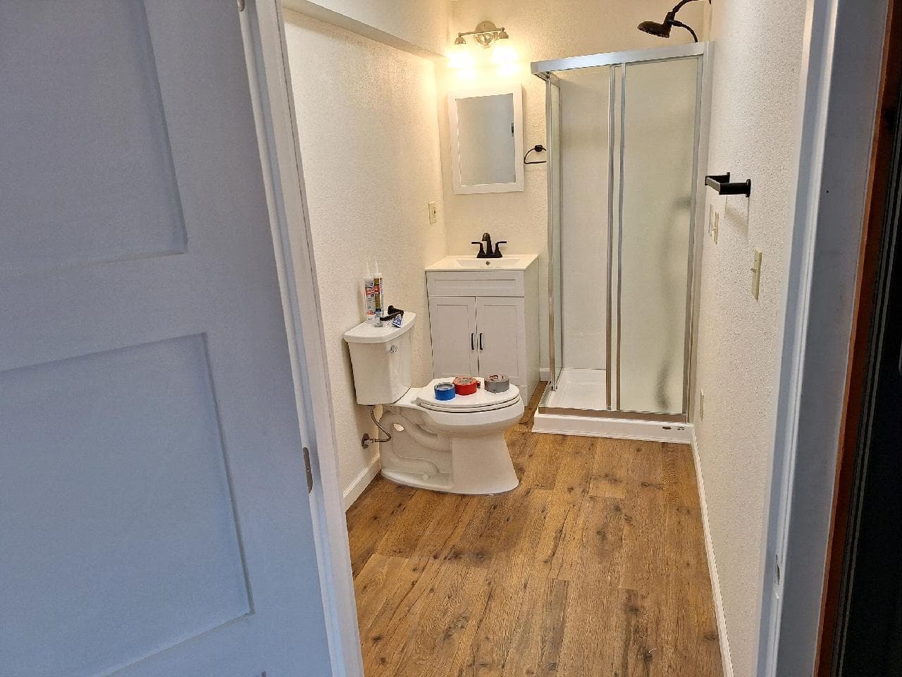 Bathroom plumbed for washer and dryer