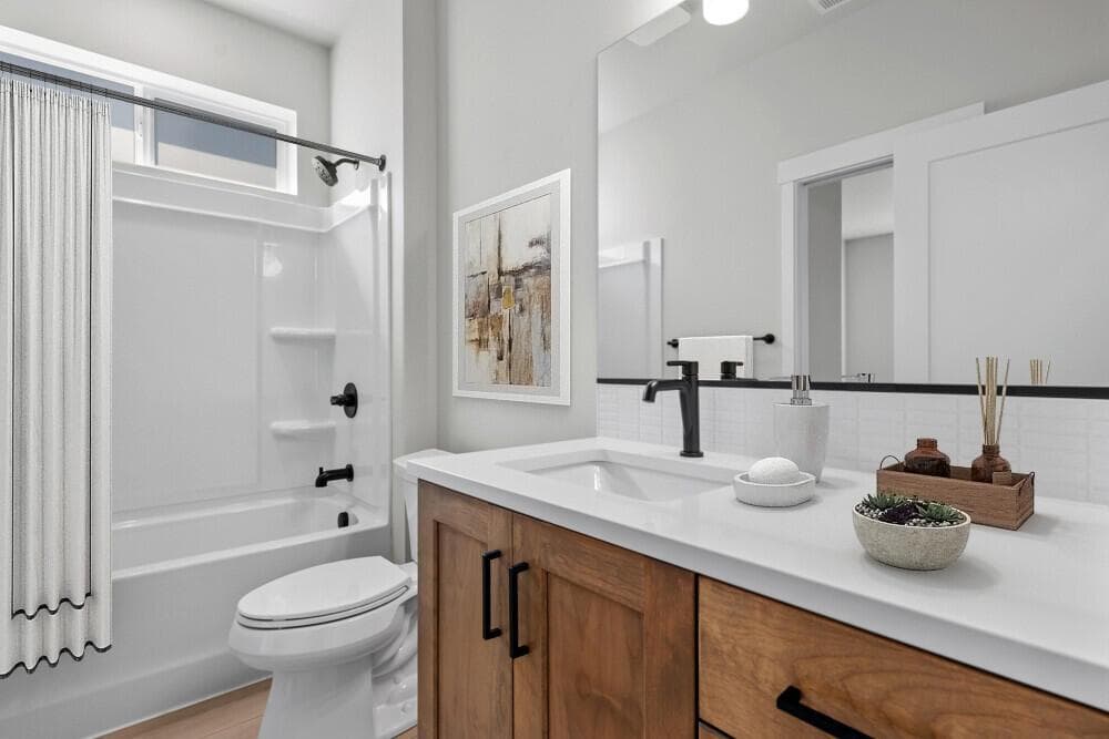 Guest bath - Virtual staging. Upgrades present. Specs and selections vary.