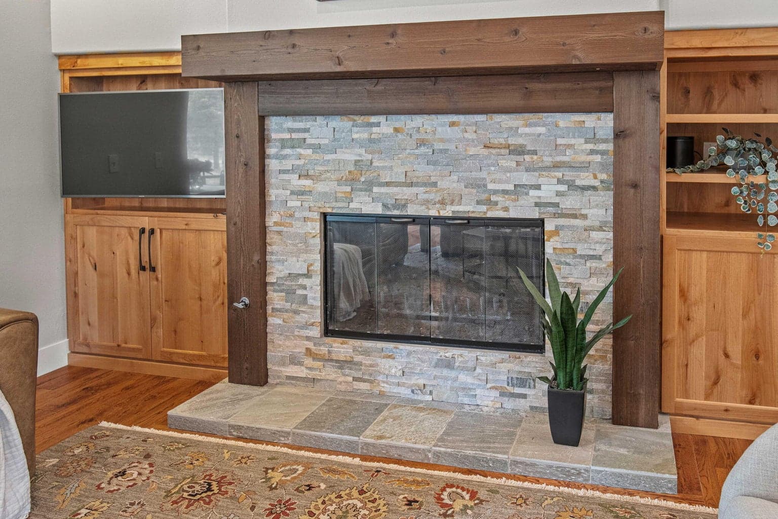 Cozy gas fireplace with built-in surround