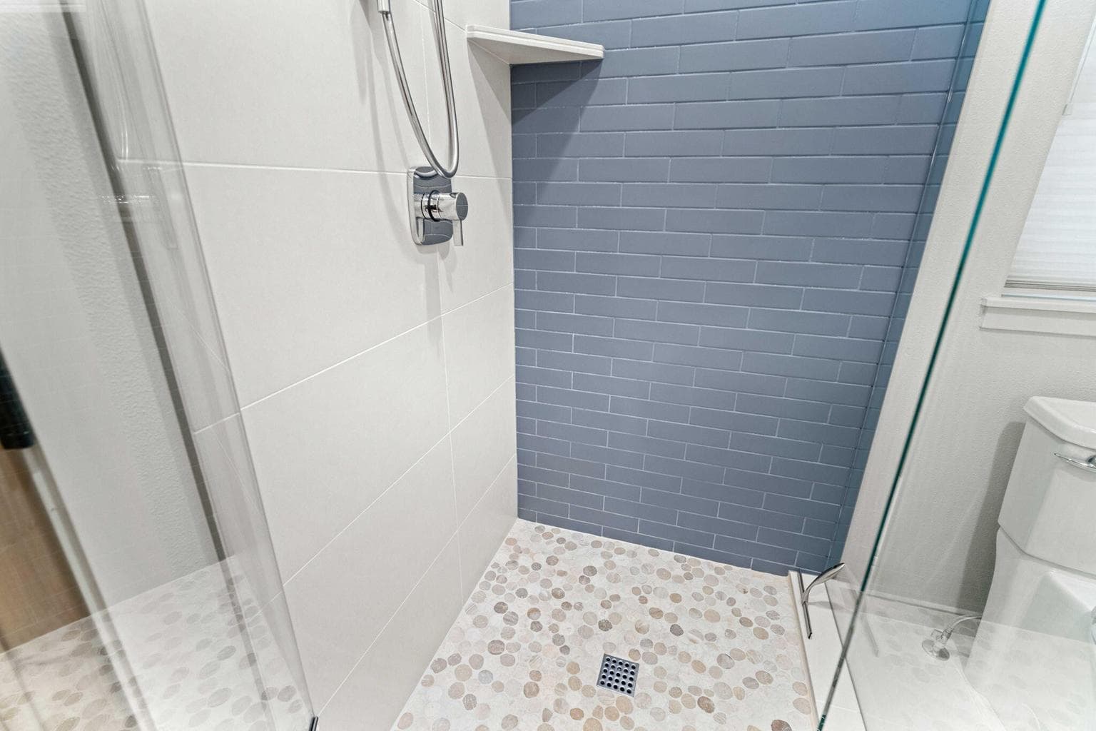 Walk in tile and glass shower