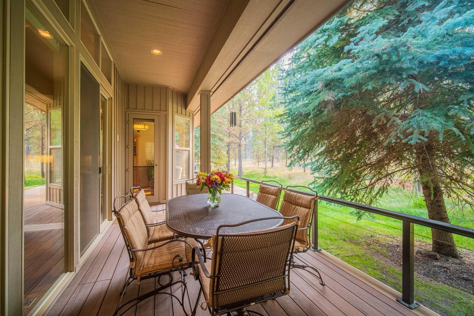 Spacious deck with clean, minimalist modern see through railing system