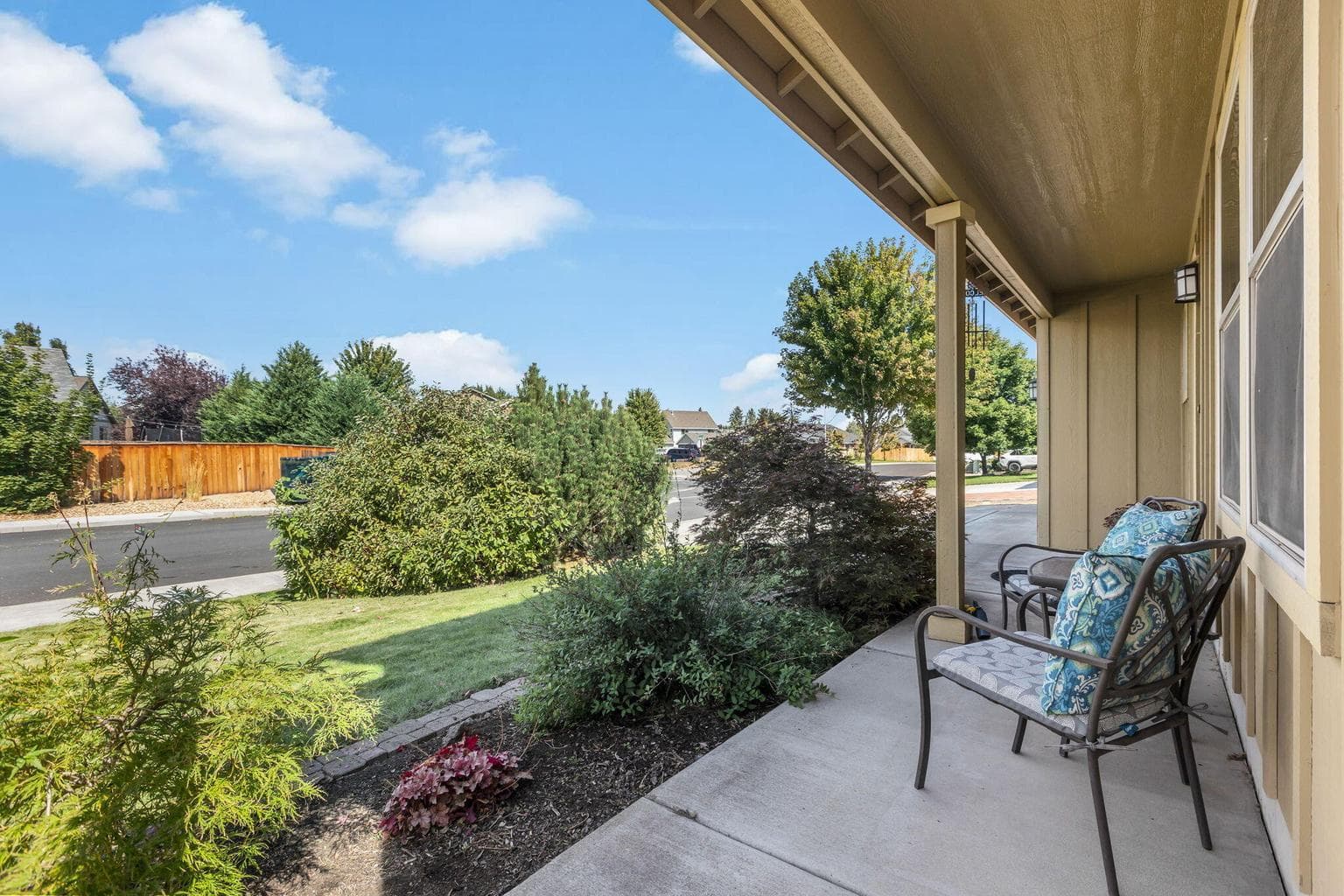 Covered front porch for relaxing or enjoying the shade in the summer.