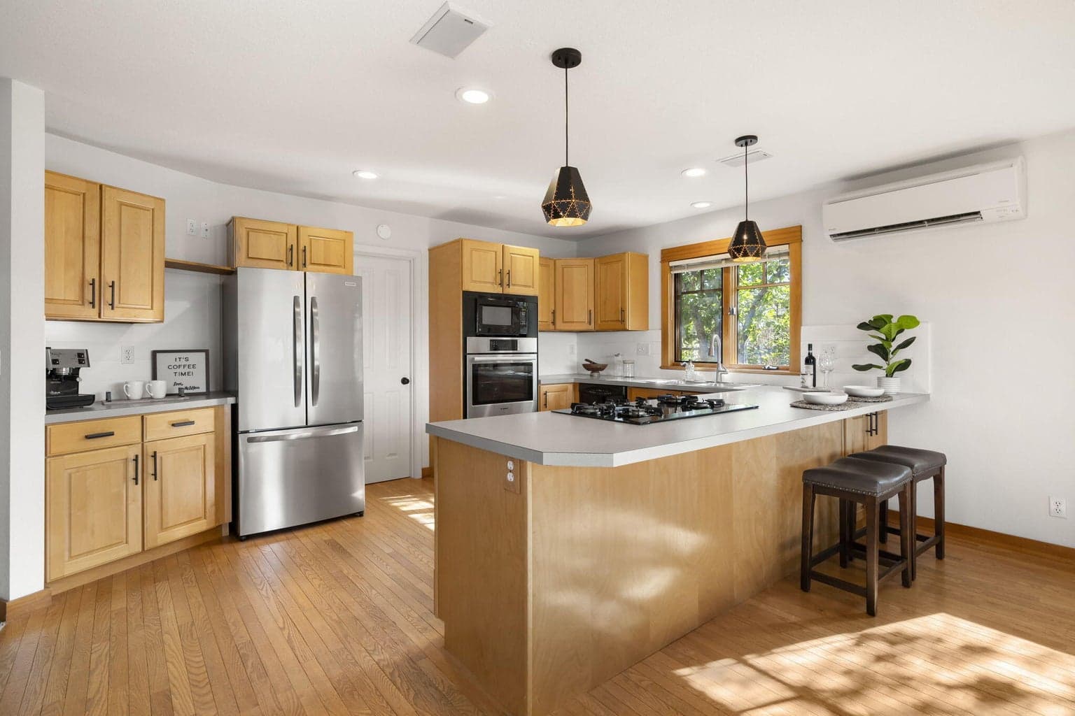 The kitchen features a spacious walk in pantry and storage.
