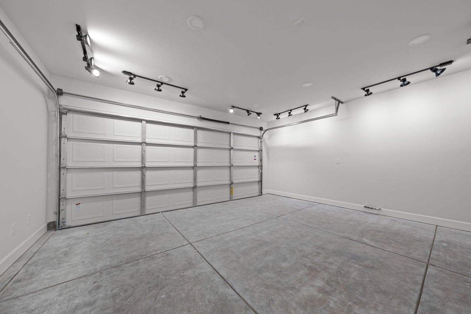 3 car garage, but it is divided into a 2 car and a walled off 1 car. Great for storage or work shop