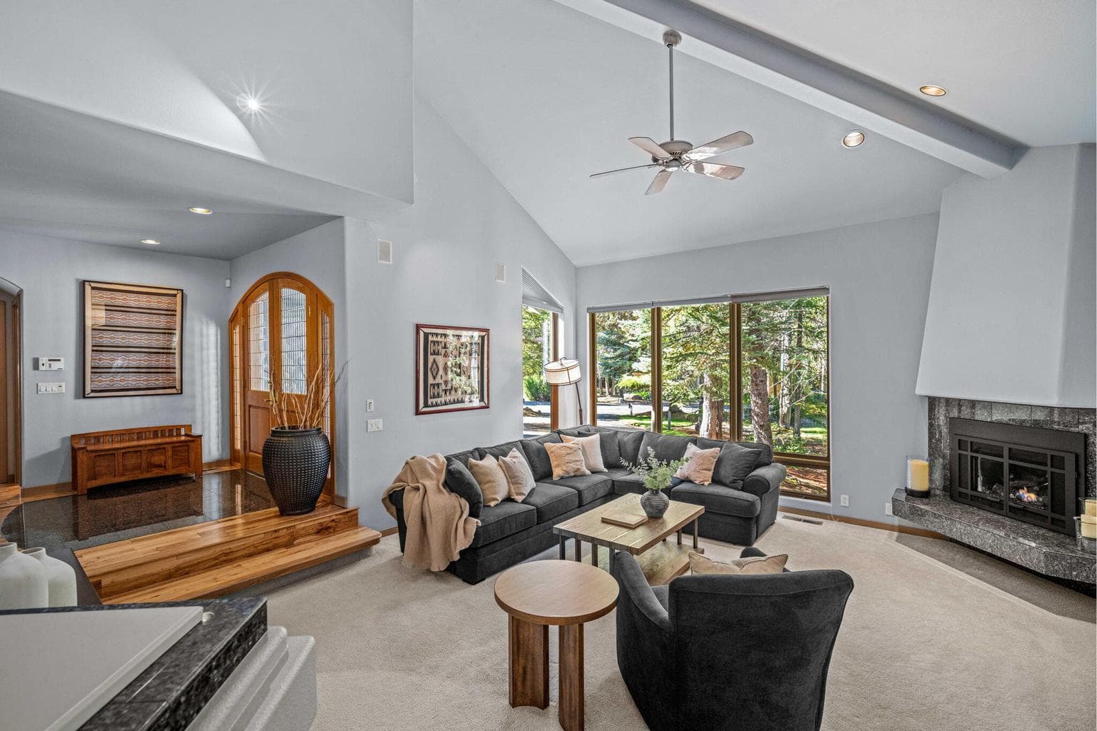 Few steps down into this spacious living room