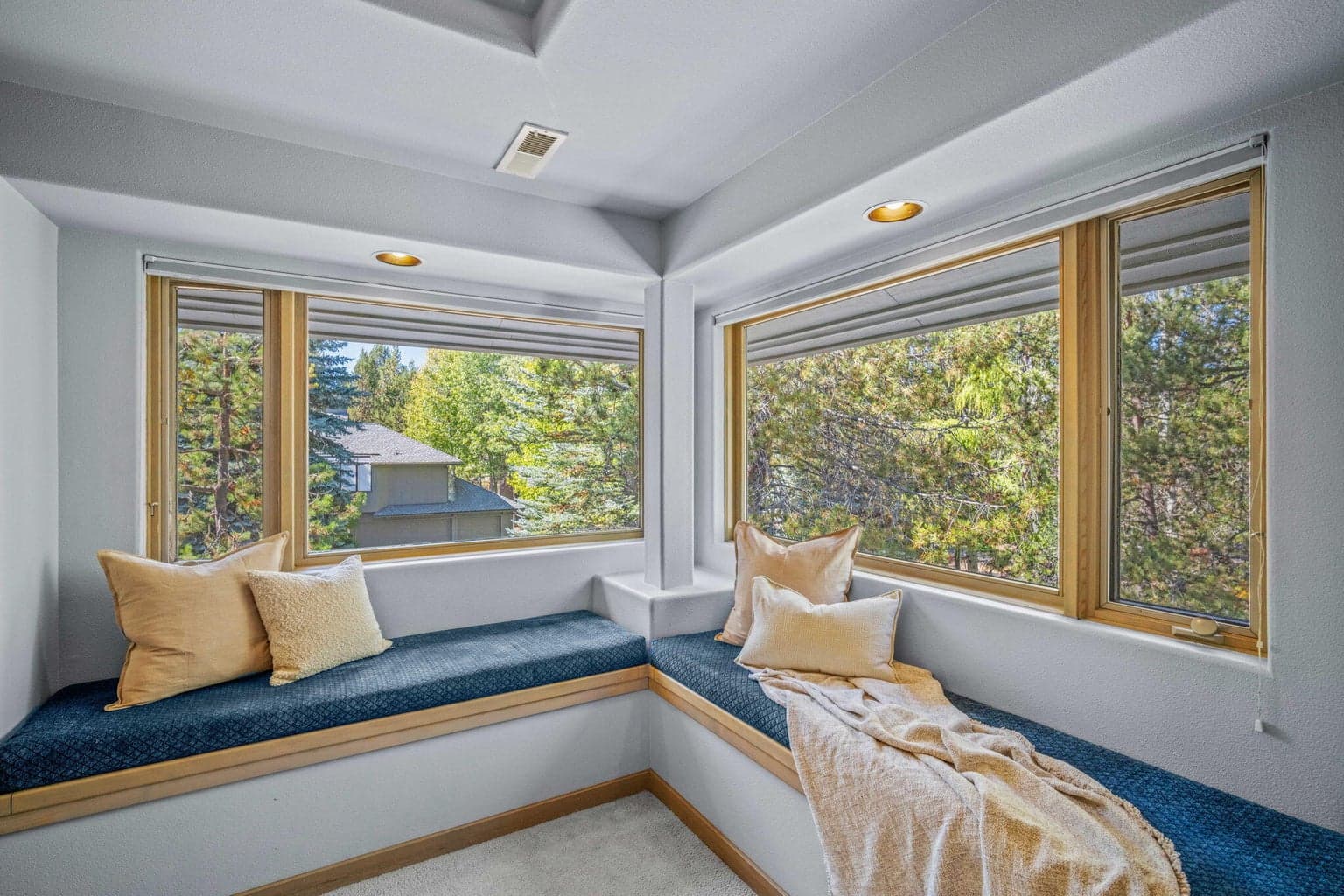 Built-in window seats lift for added storage