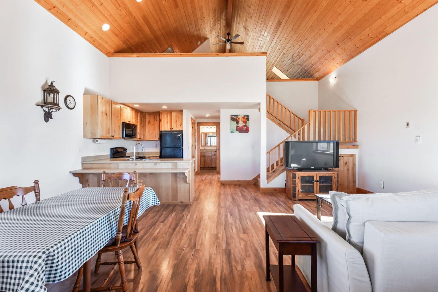 Great room & kitchen with vaulted ceiling