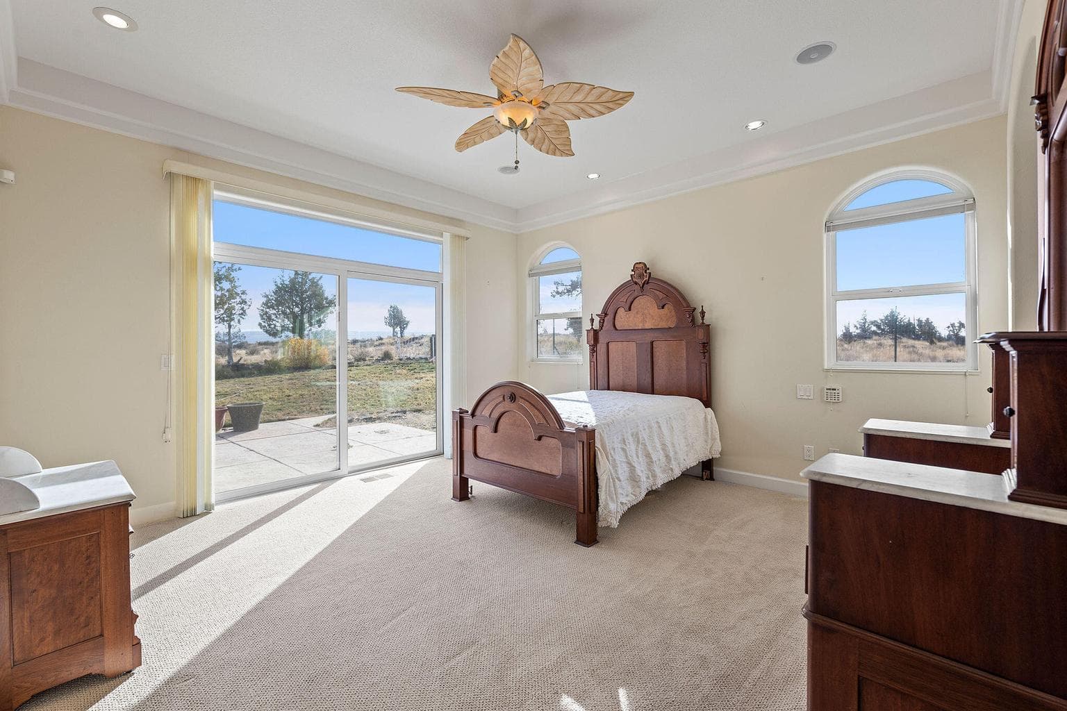 Master bedroom with patio access.
