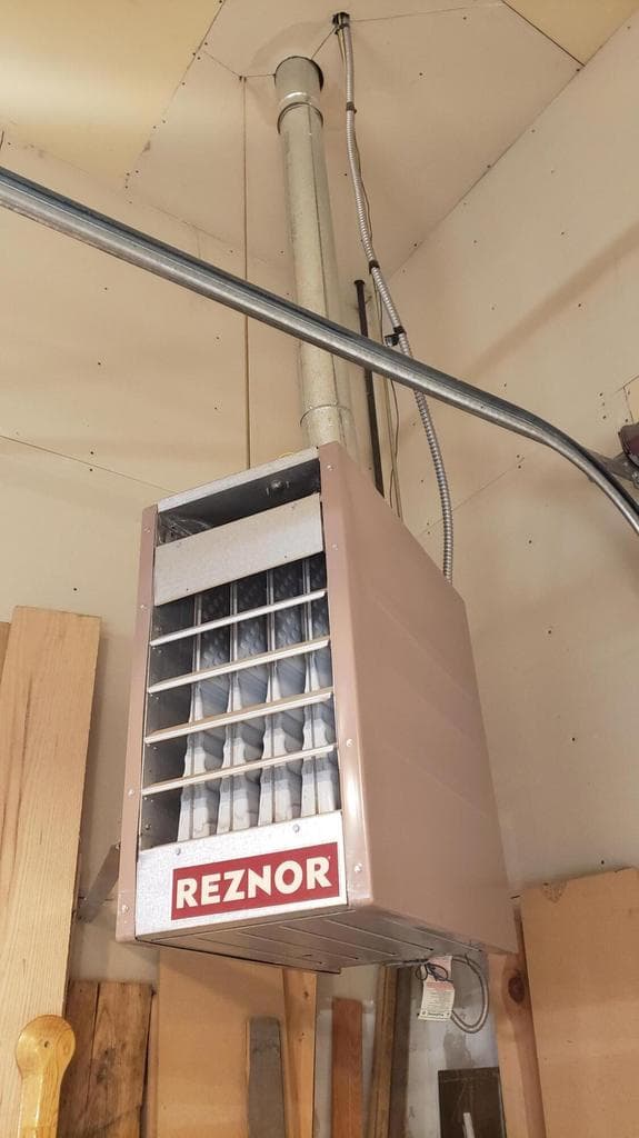 Heated shop space with upstairs additional storage