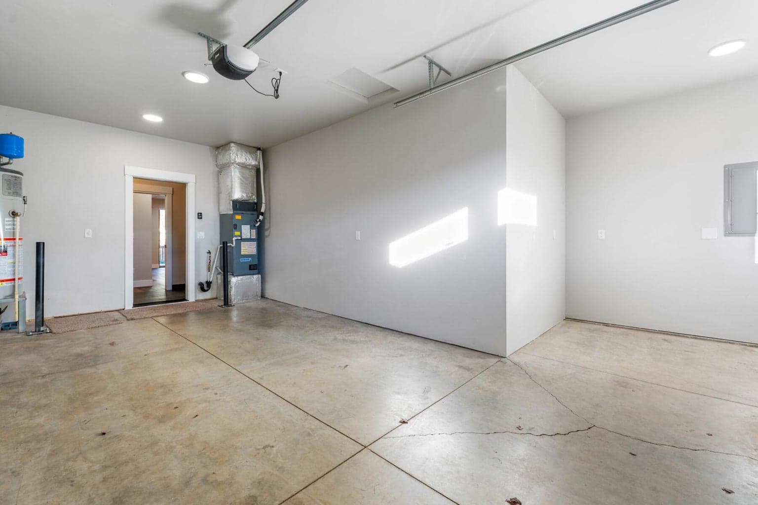 Oversized one car garage with storage area