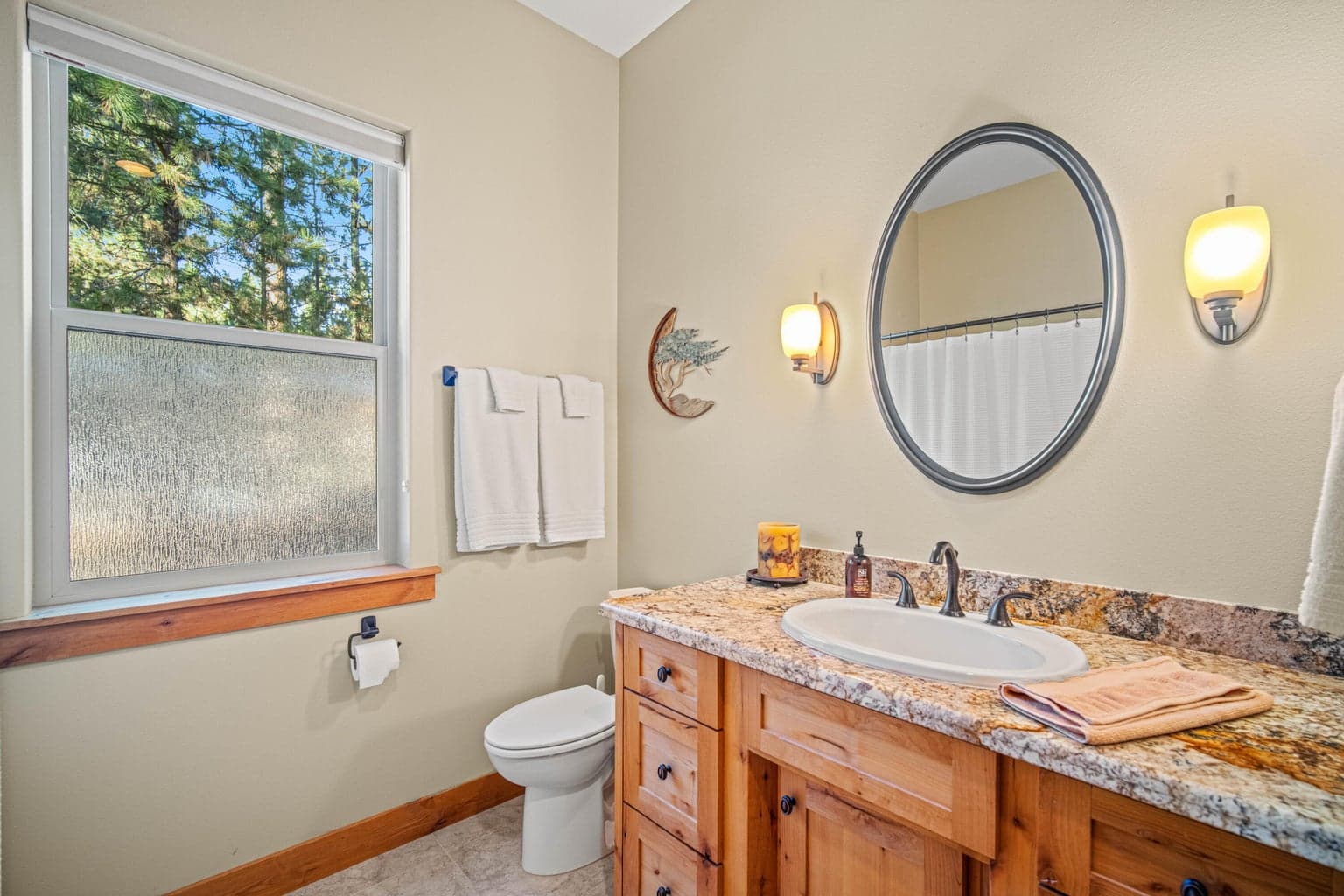 The Guest Bath also has granite counter tops.