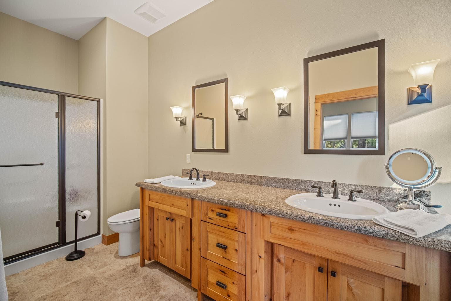 A walk-in shower, soak tub, double vanity and granite counter tops complete the Primary Bath.