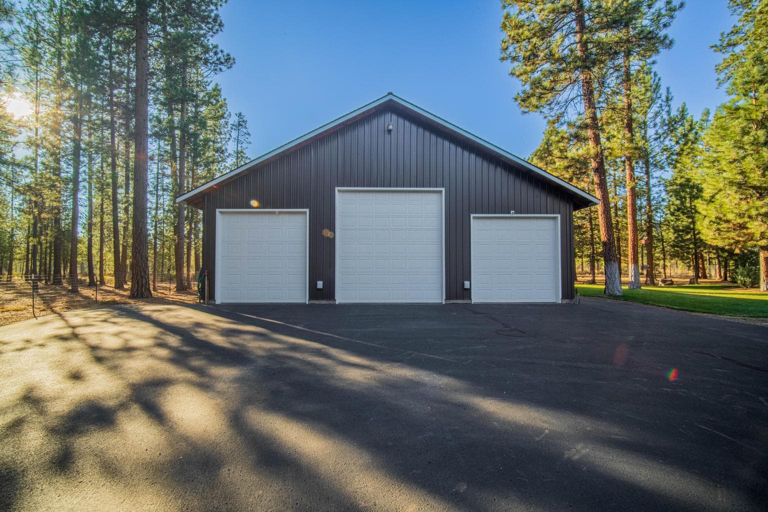 The 1992 s.f. shop is built on a stem wall, is framed and insulated.
