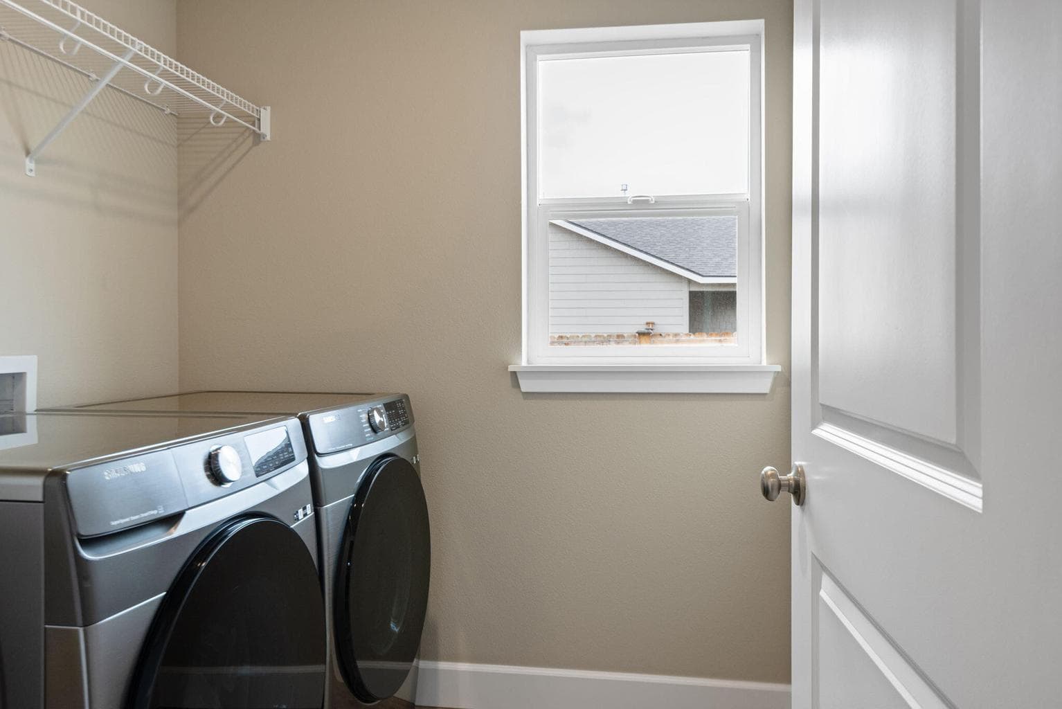 Dedicated Laundry Room (washer and dryer not included)