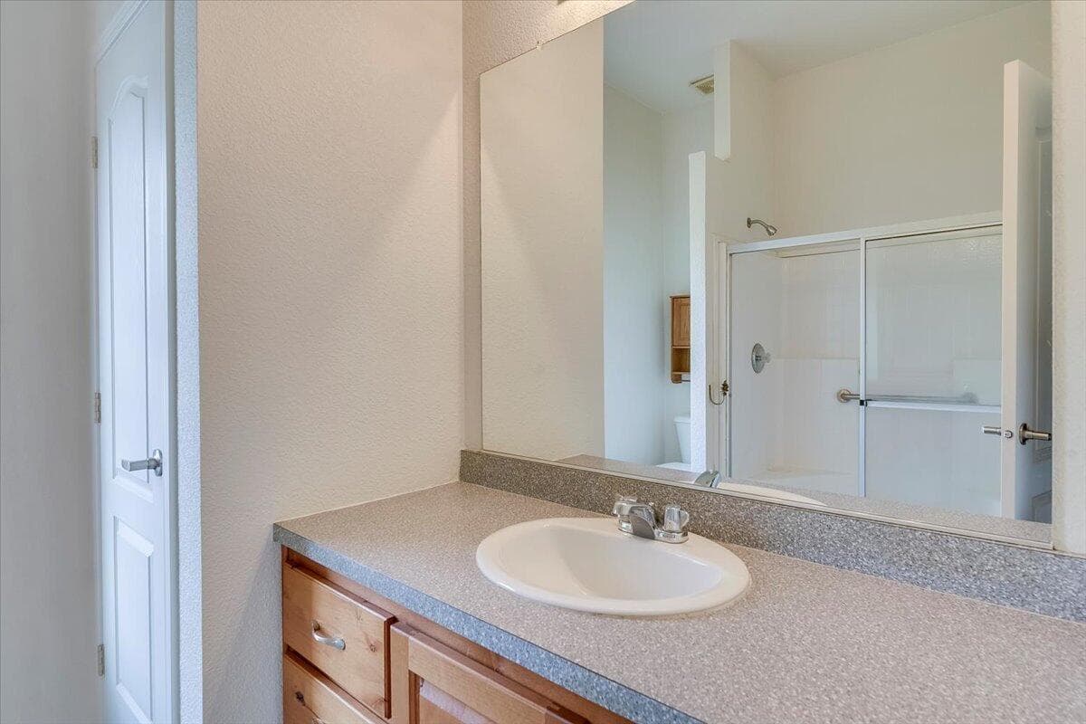 second full bathroom on west side of house with linen closet