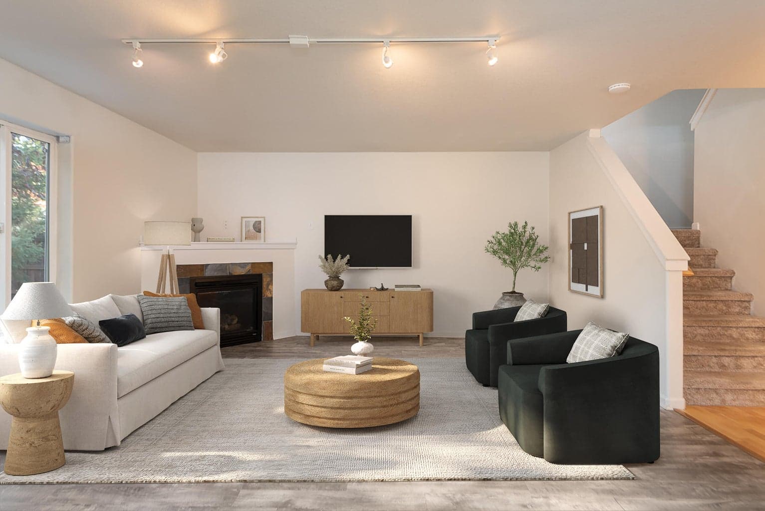 Living room is warm and inviting including a gas fireplace for those chilly nights.