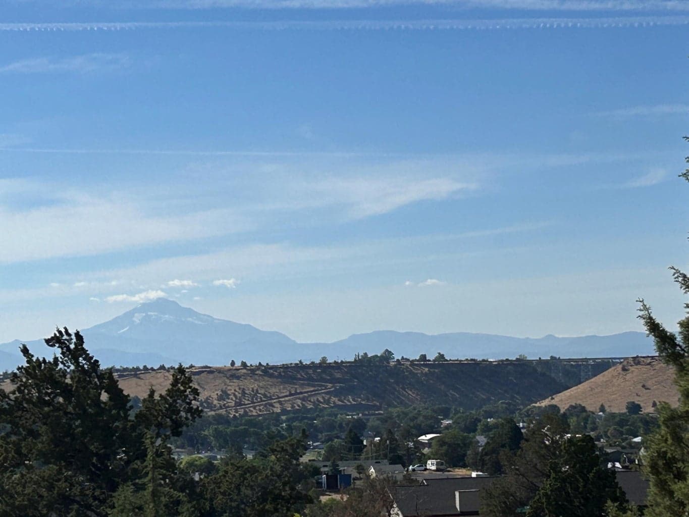 Views of Mt Jefferson and Mt Hood from your family room and den