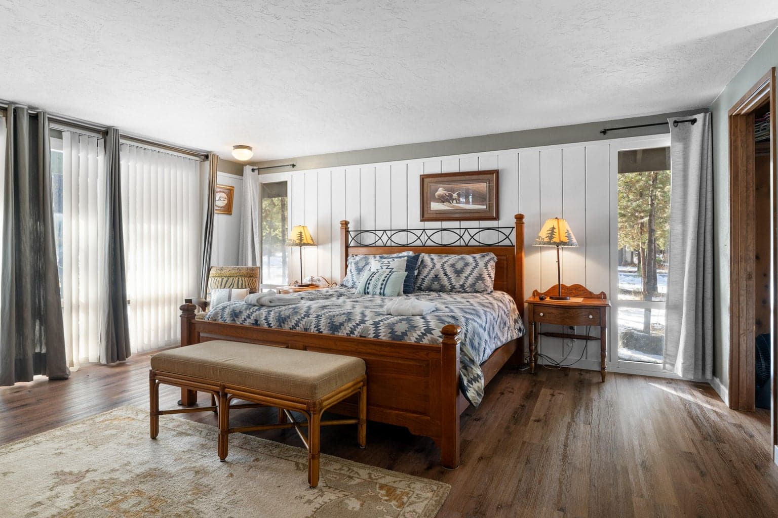 The main level features a large primary bedroom.