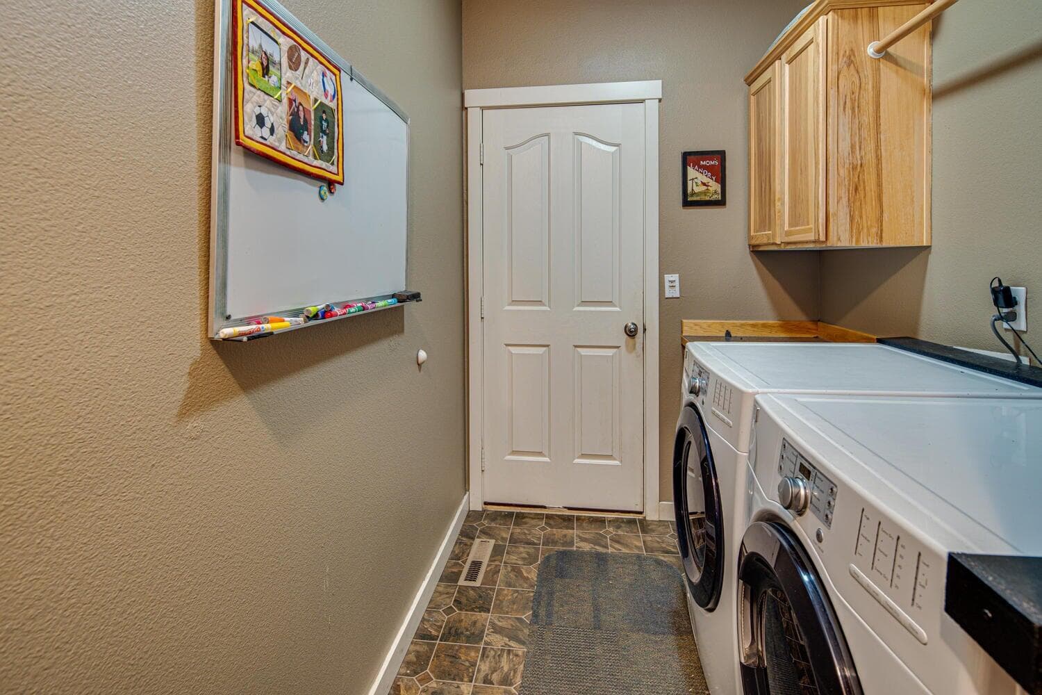 Utility room with garage access