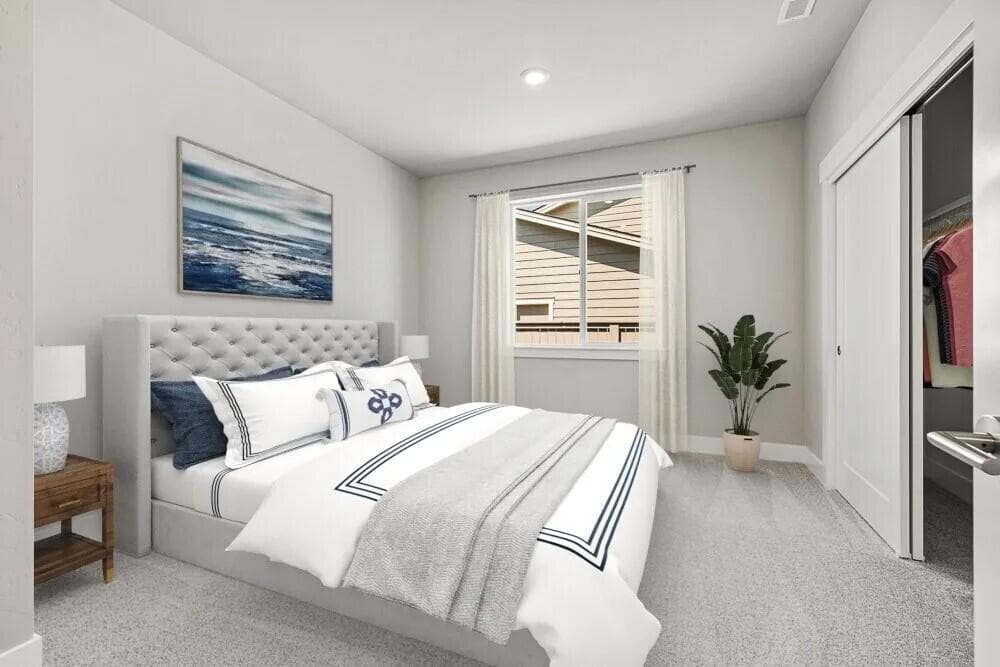 Sample photo reflecting a similar plan. Guest bedroom - Upgrades present. Specs and selections vary.