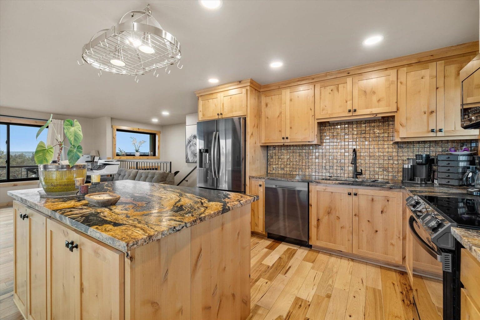 Stainless steel appliances, granite counters, tiled backsplash, upgraded cabinets.