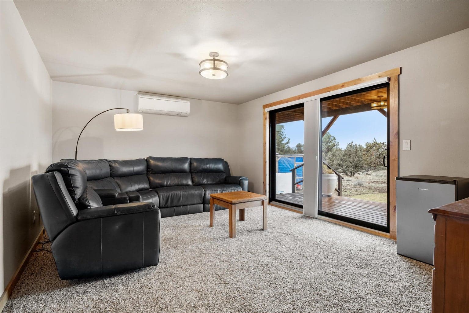 Spacious downstairs living area opens to lower deck.