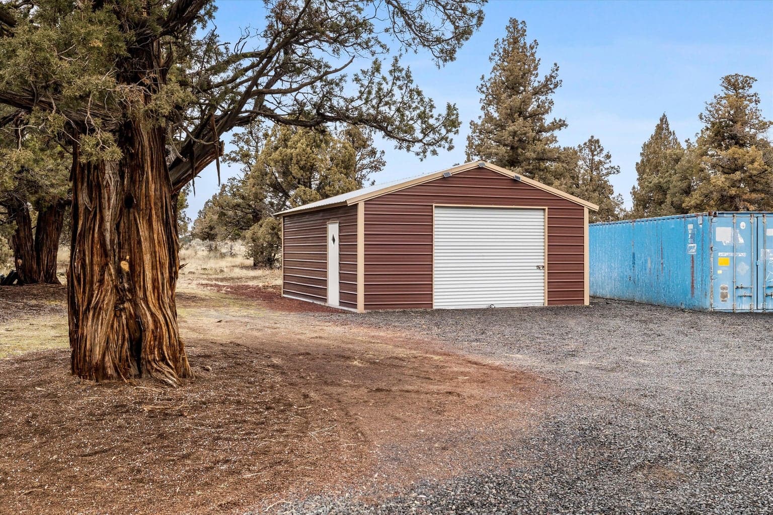 Shop & Storage. (The storage container does not go with the property.)