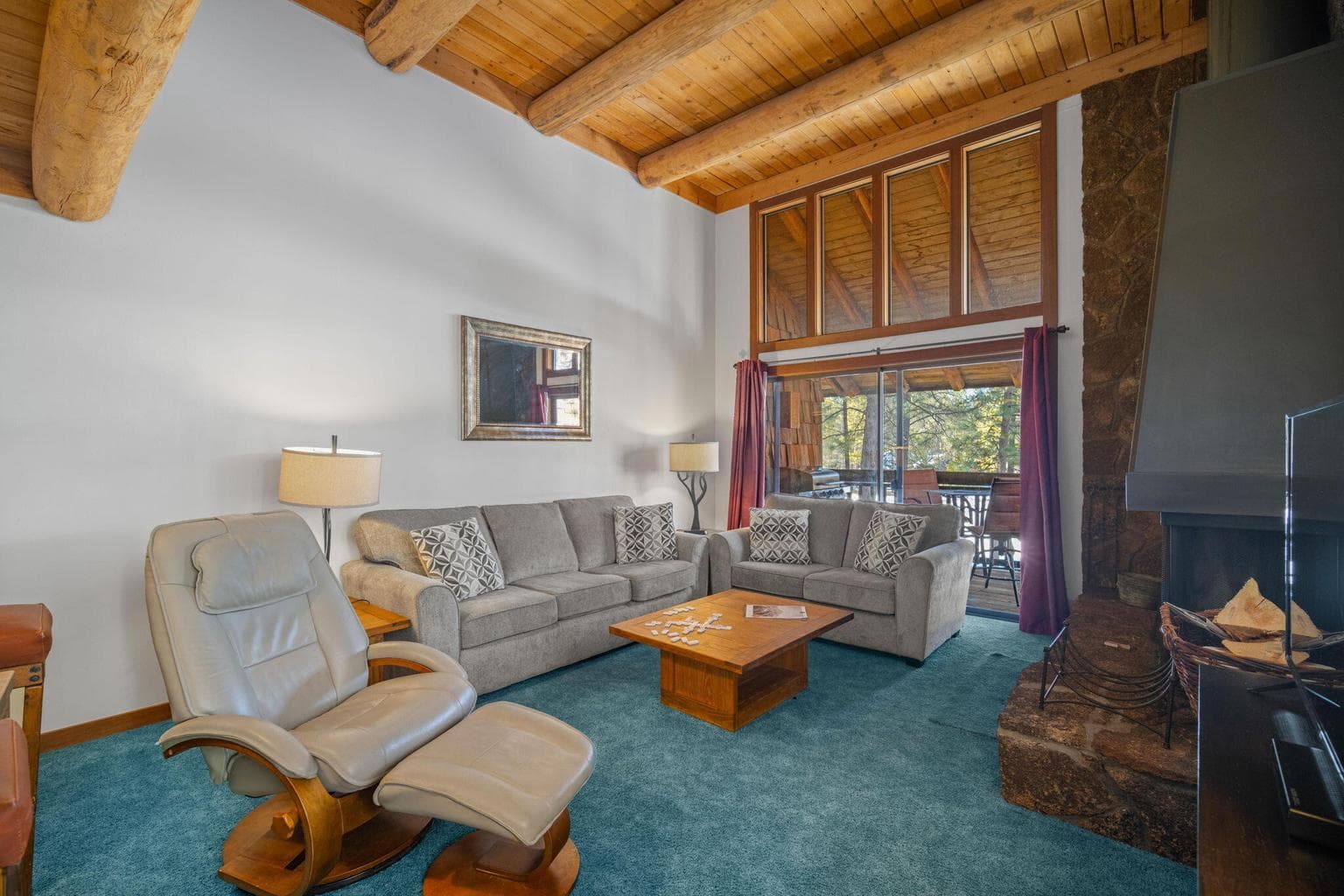 Notice the tall rustic wood ceilings!