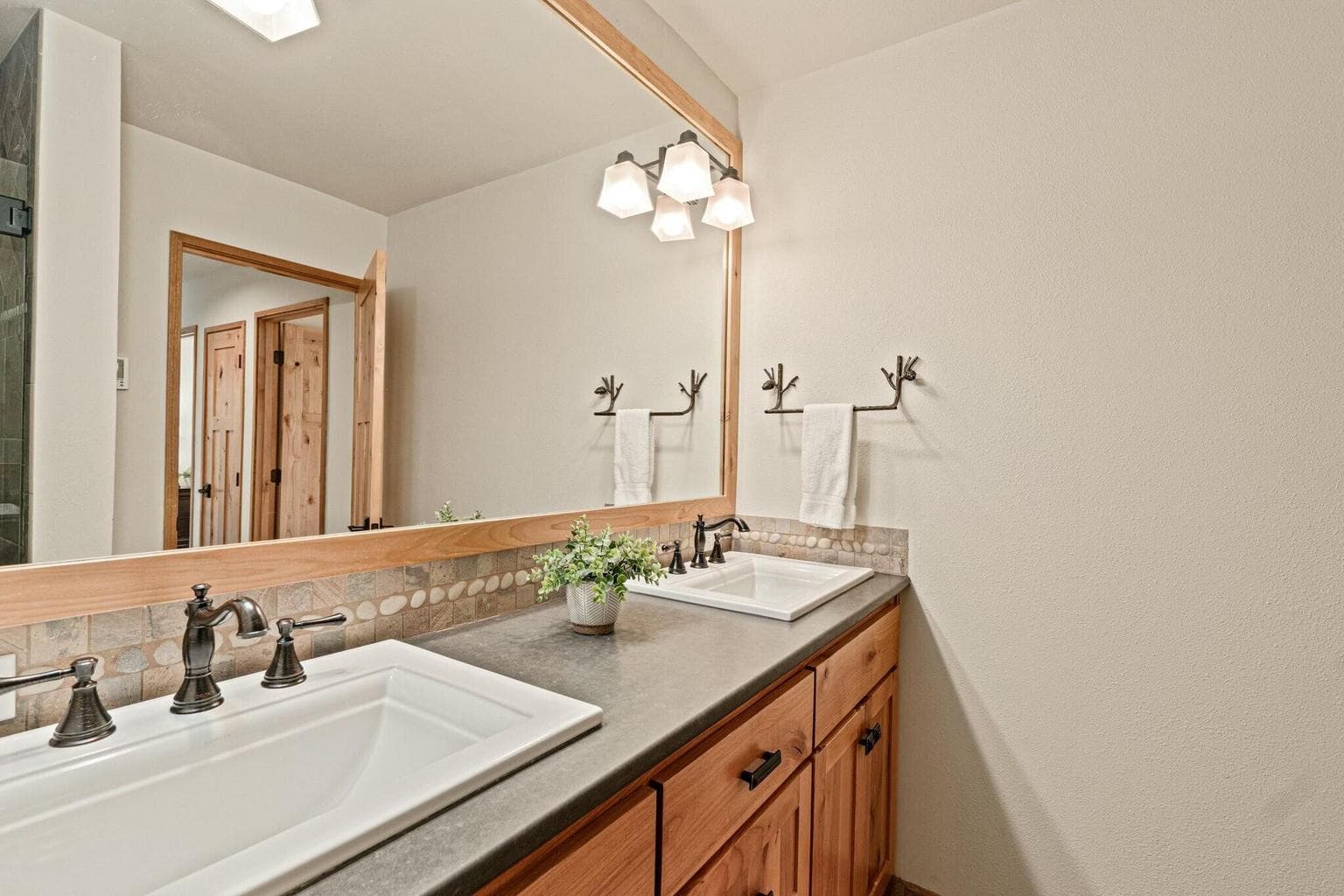 Remodeled with solid surface countertops and tile shower.