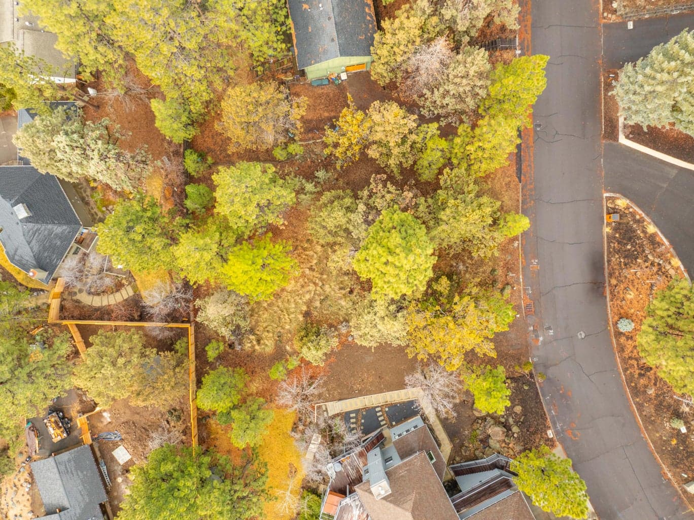 The lot's south-facing orientation not only provides glimpses of Mt. Bachelor but also opens up possibilities for passive solar design, depending on the chosen layout.