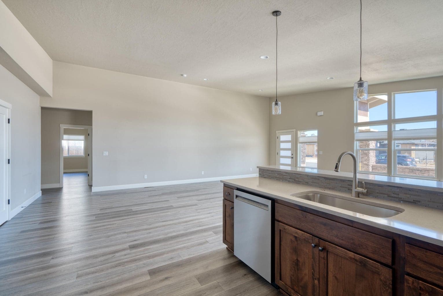 Stainless Steel Farm Sink & Wooden Cabinetry