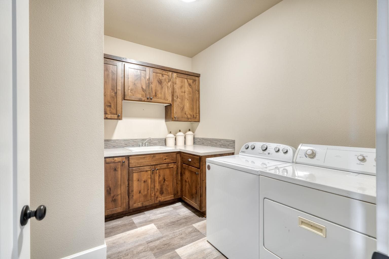 Well-Appointed Laundry Center with Sink