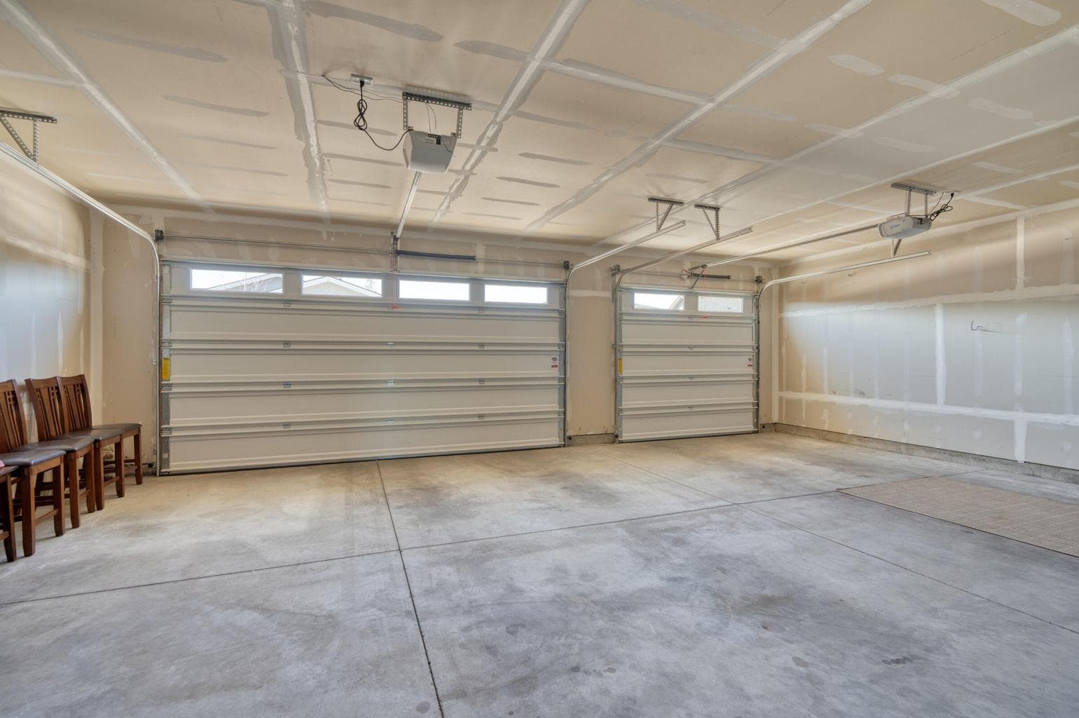 Spacious Three-Car Garage with Rear Alley Access