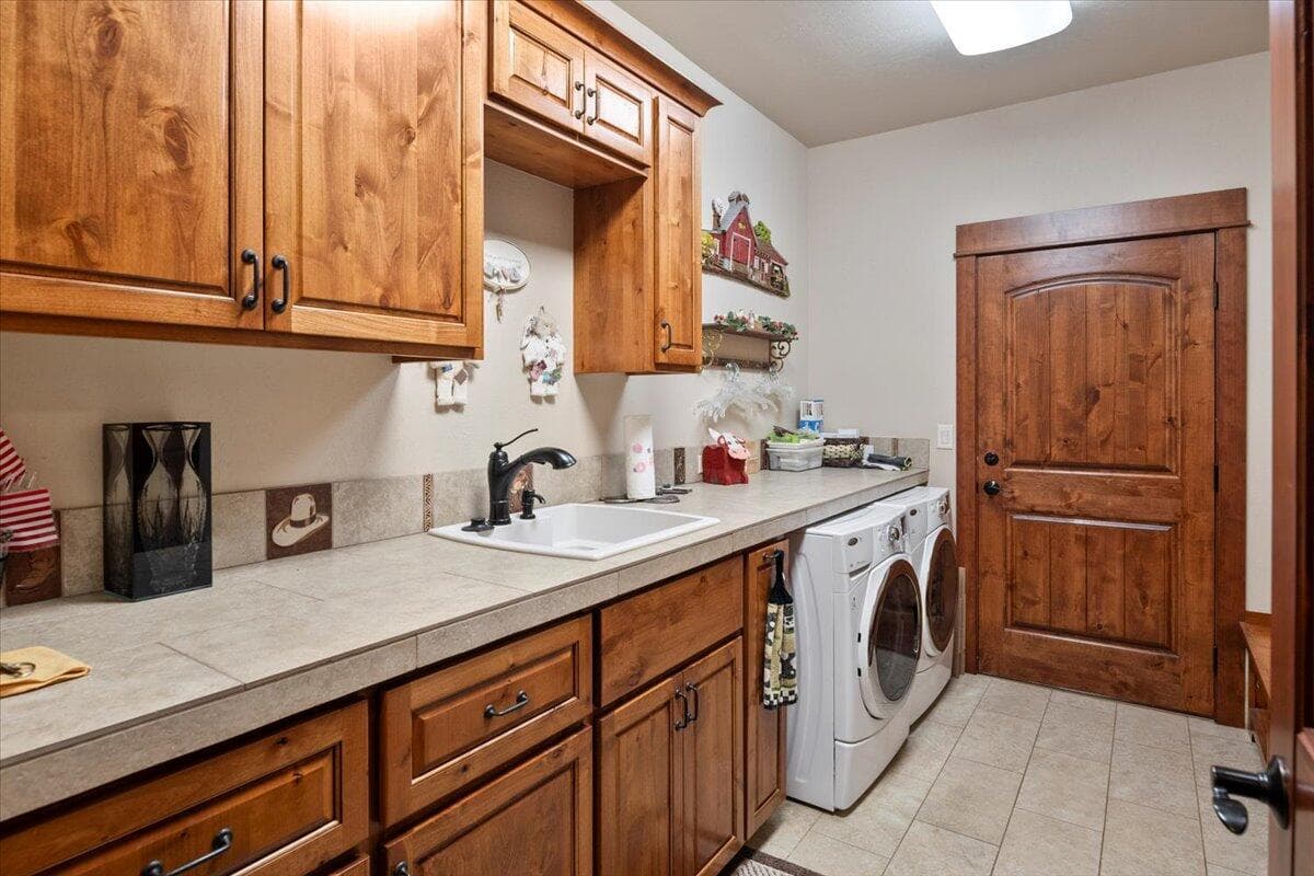 Spacious utility with tons of storage and sink