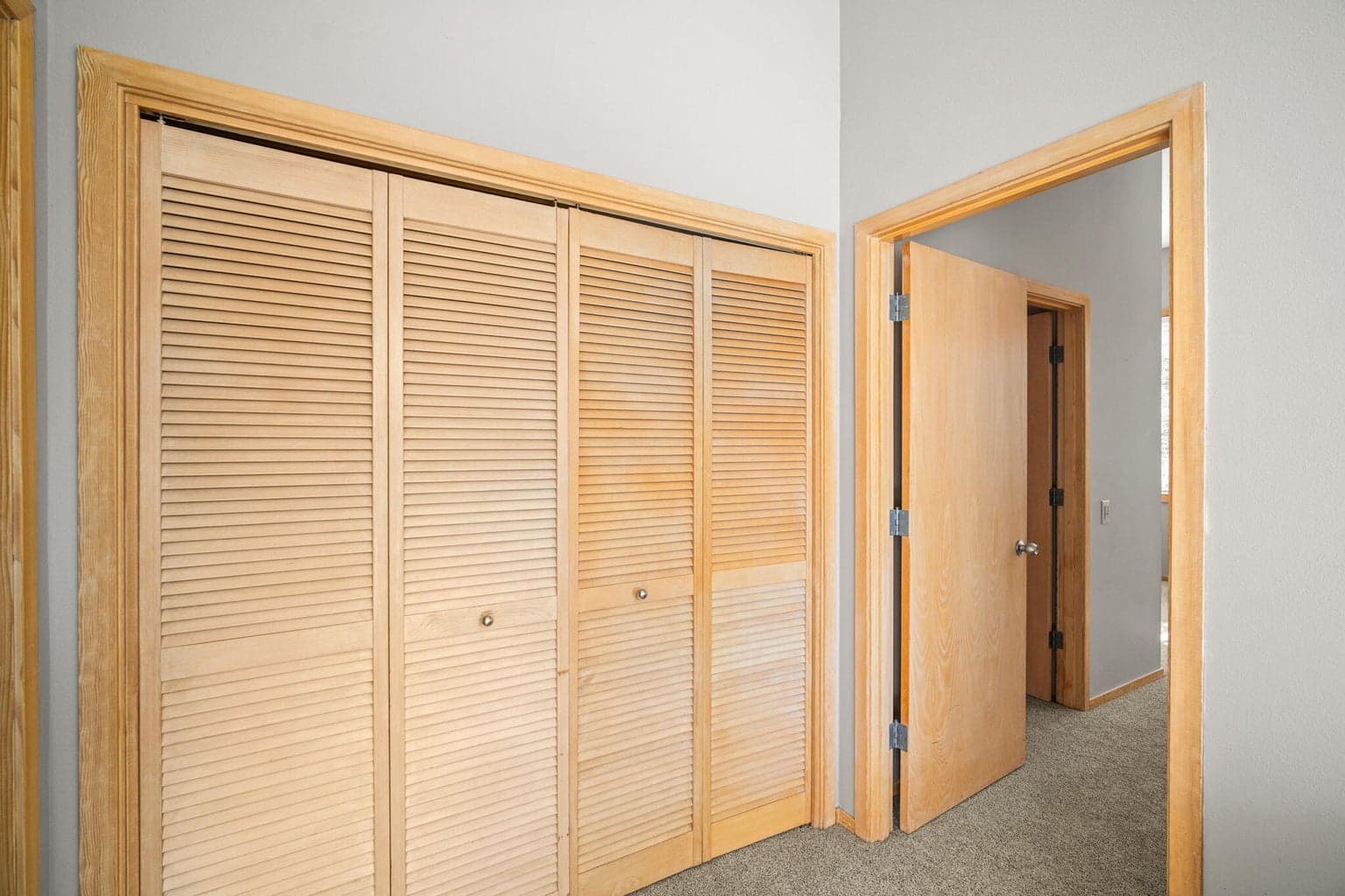 Laundry closet upstairs between the two primary bedrooms