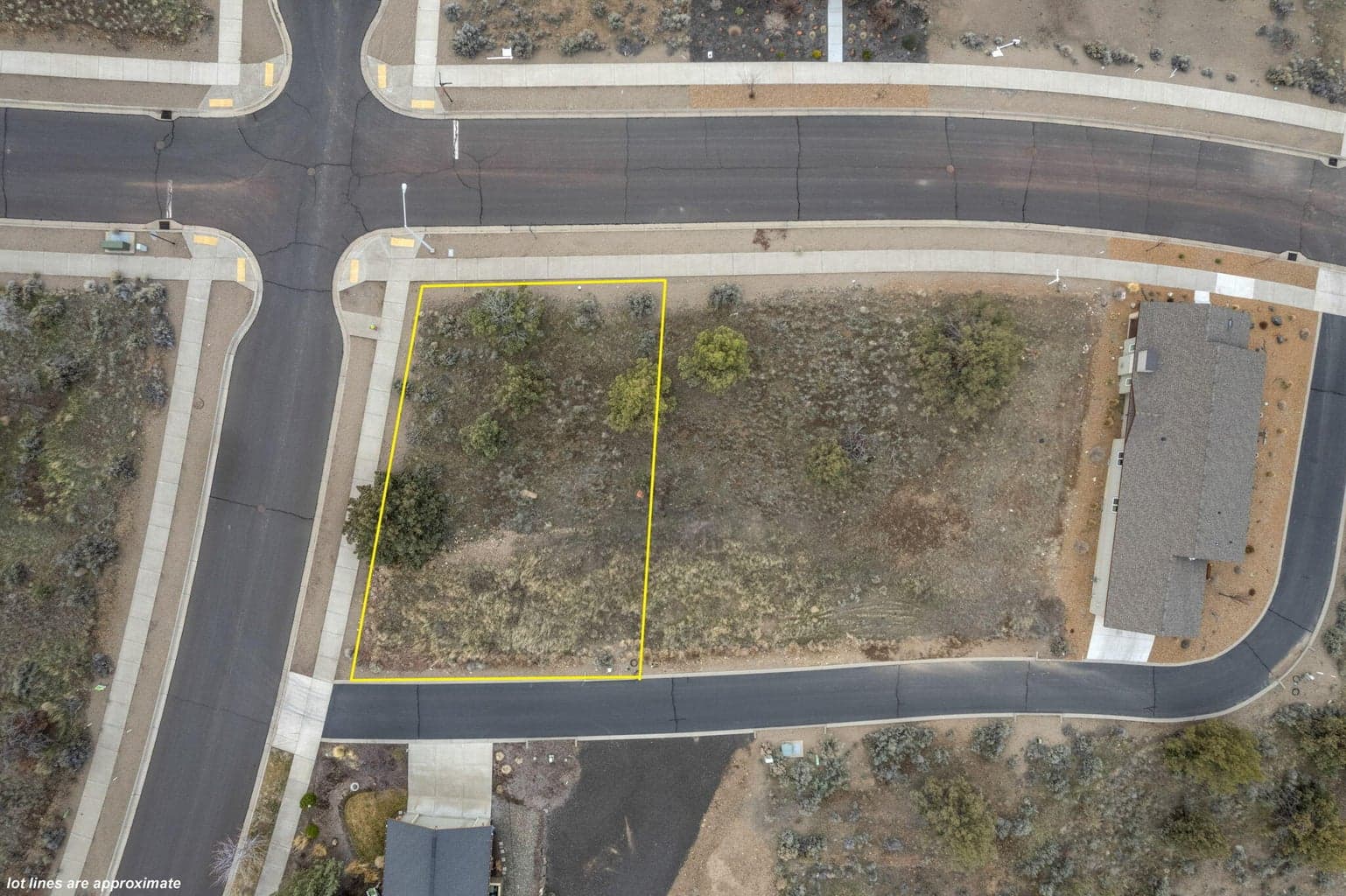 Showing the paved street access along SE Greenleaf Lane.