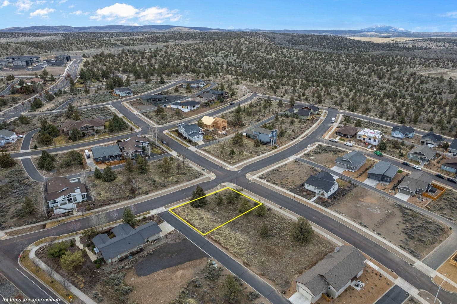 Another perspective showing the lot’s size and landscape.