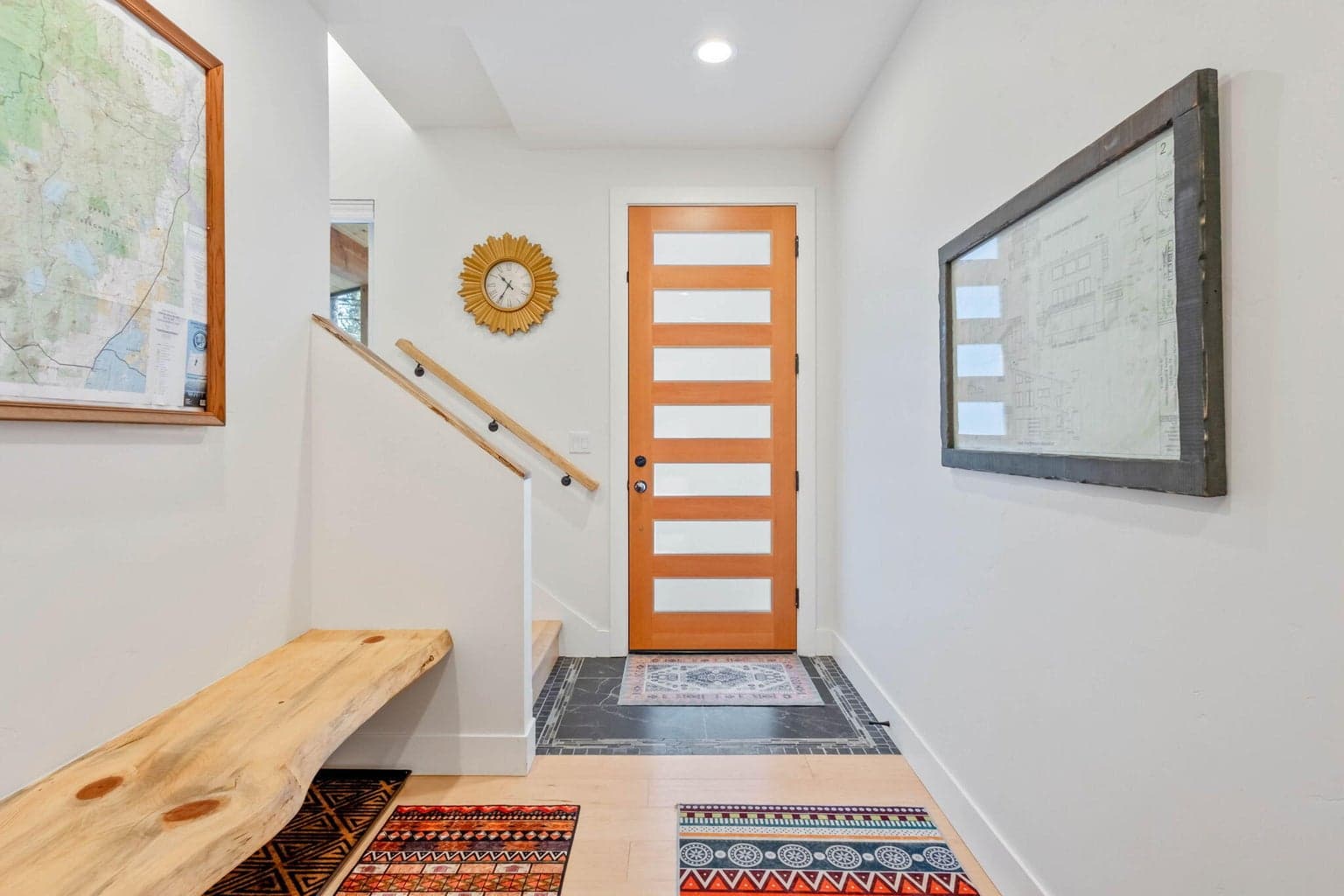 Have a seat and take your shoes off in the spacious entry and storage area