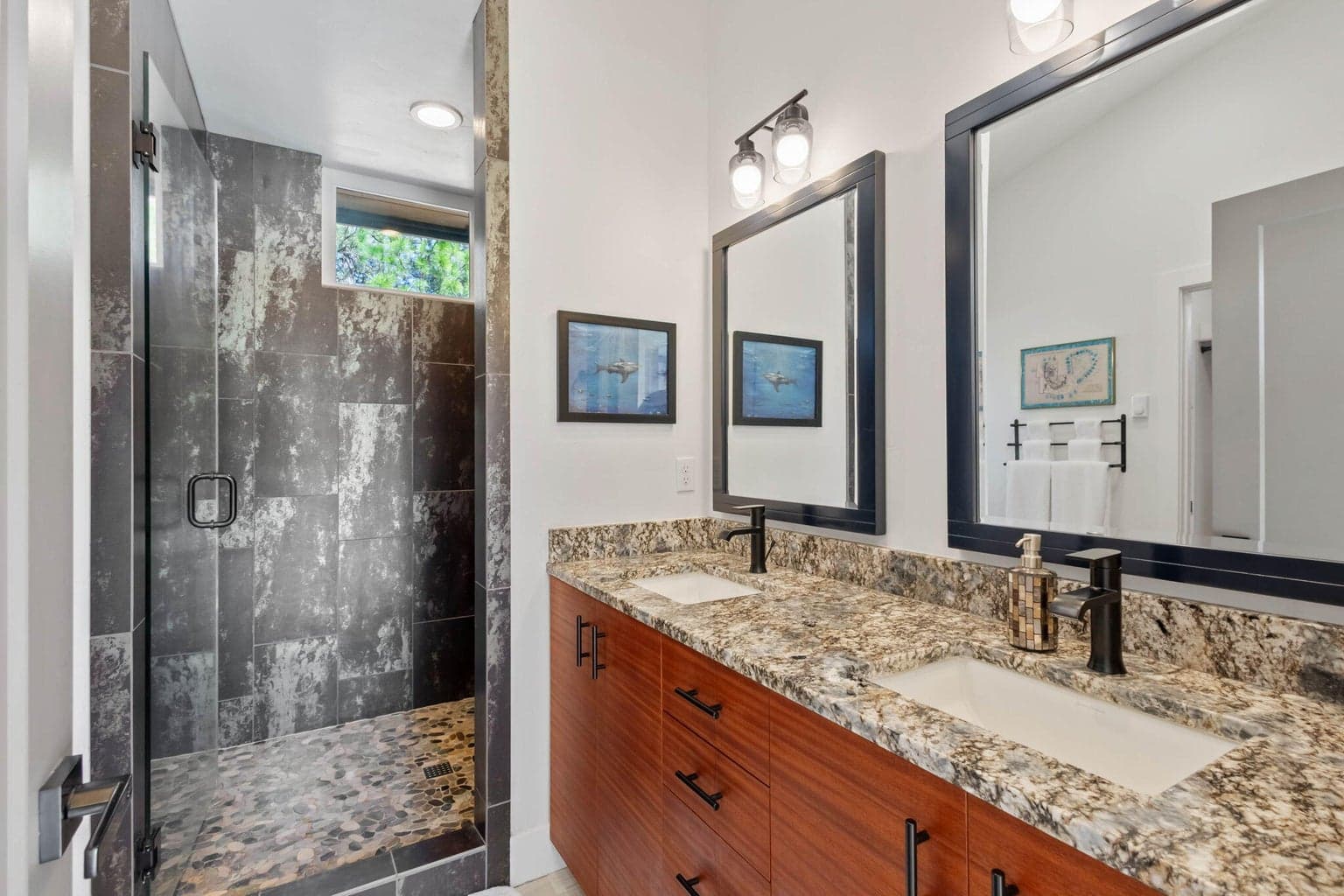 Primary Bath features double vanity and stone shower