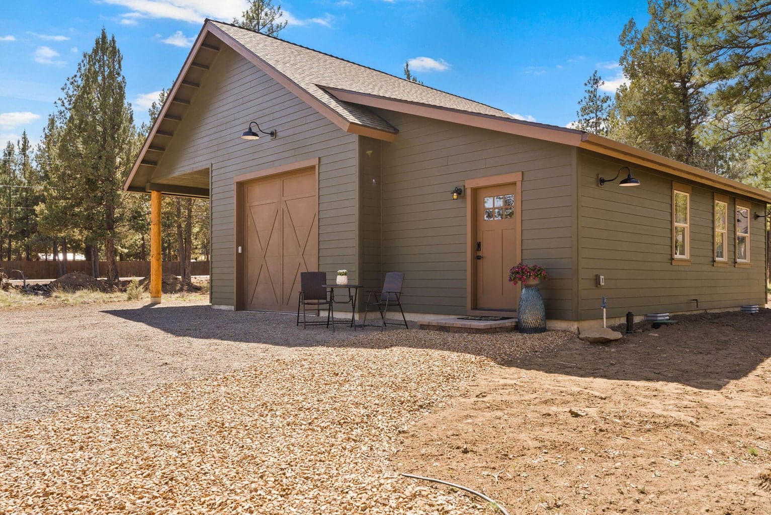 HUGE detached shop! 10 foot electric door, covered parking, 220V hook ups, and a flex space complete with full bath and kitchenette potential.