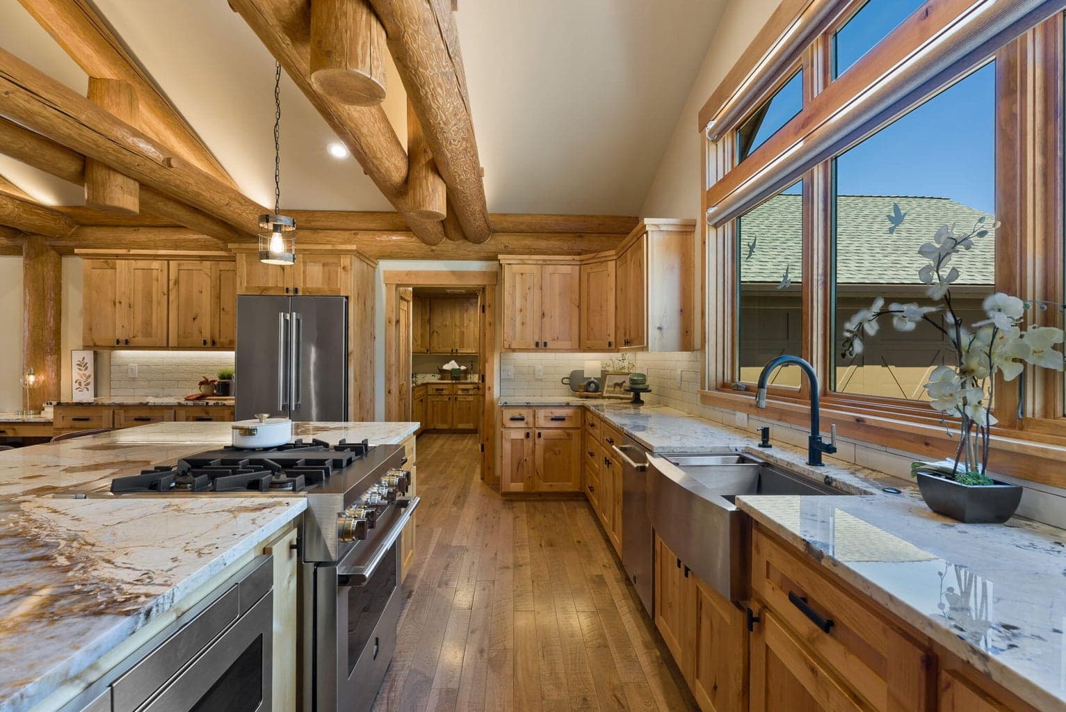 Custom kitchen with granite countertops, high-end appliances, butler pantry, & more!