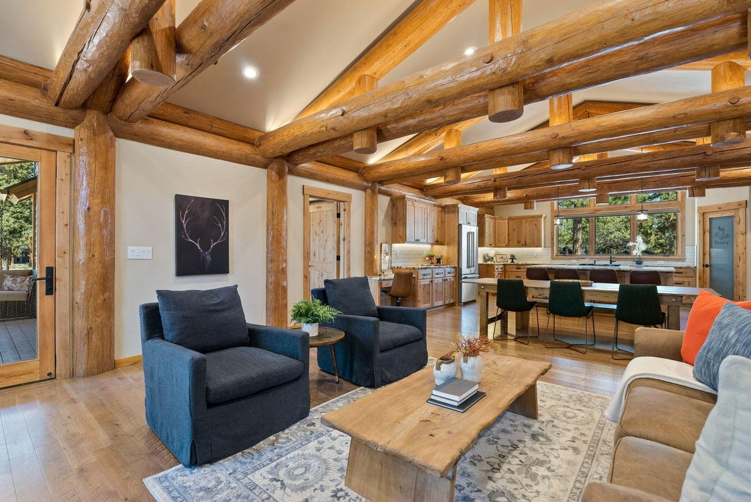 Great room with access to covered back outdoor living areas.