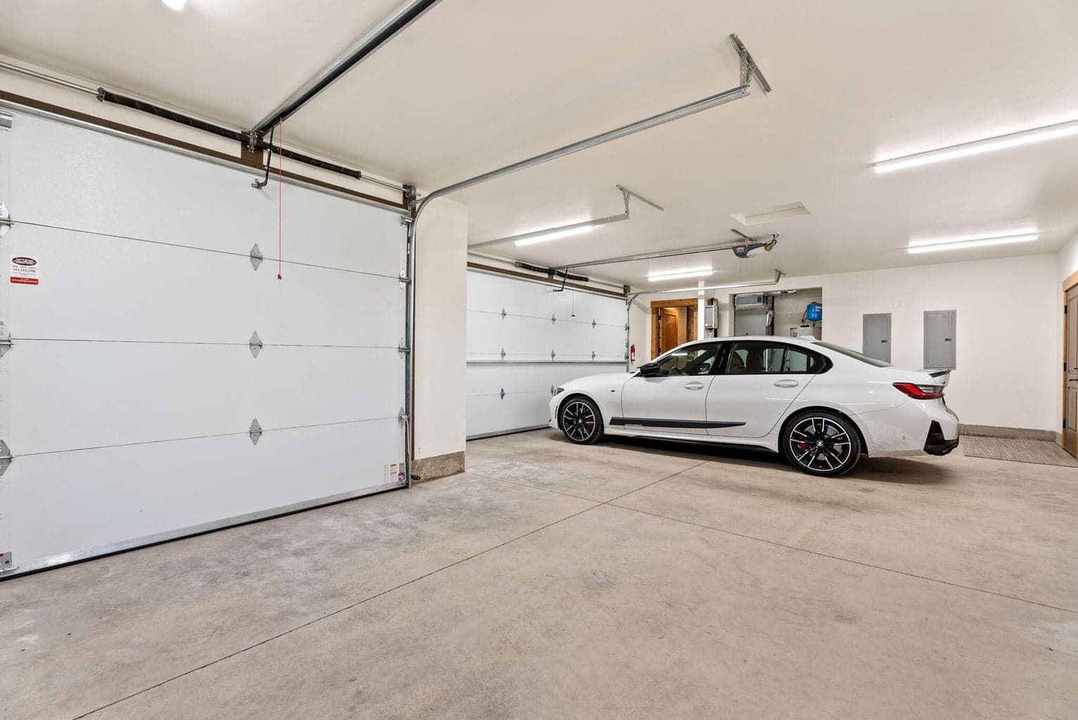 3 car attached garage plus workbench and room for storage! Readily available for EV charging AND solar panels!